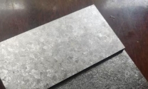 钛晶板是不是塑料的材质好些呢怎么辨别真假